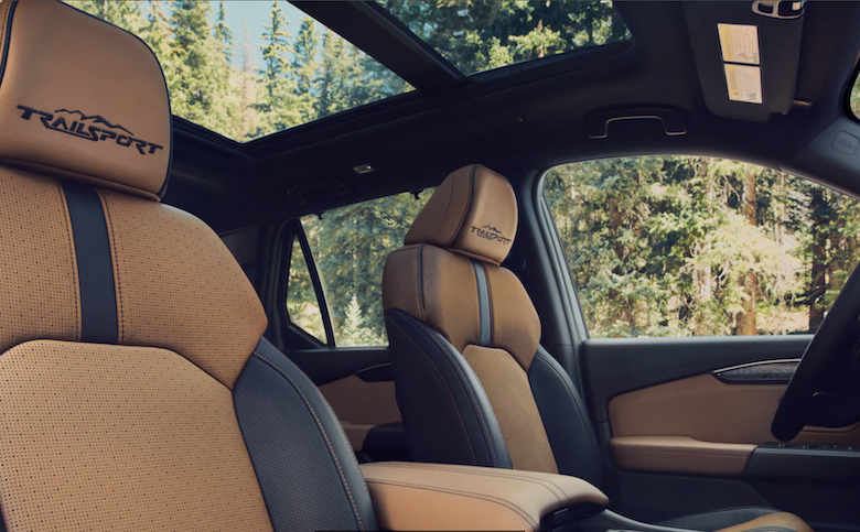 New features for the 2025 Honda Passport includes rear door sunshades, orange interior stitching, and front heated seats.